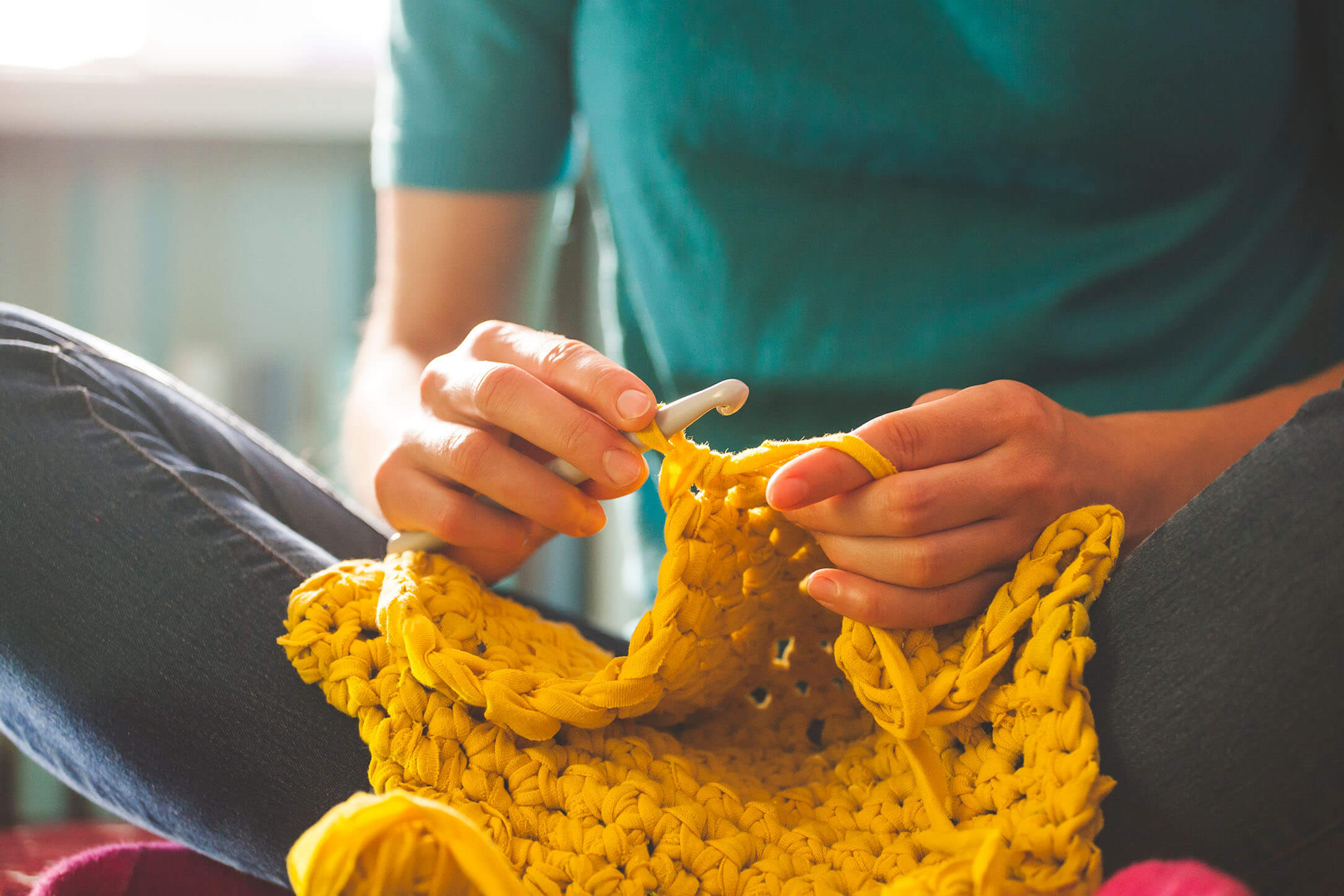 A woman doing crochet