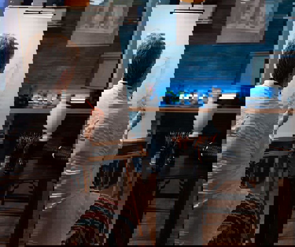 Person drawing a vase