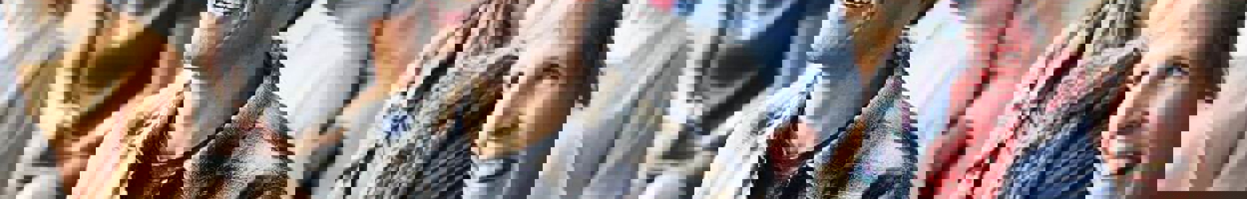 Mature students smiling in classroom