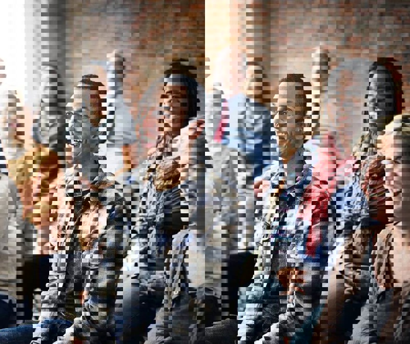 Mature students smiling in classroom