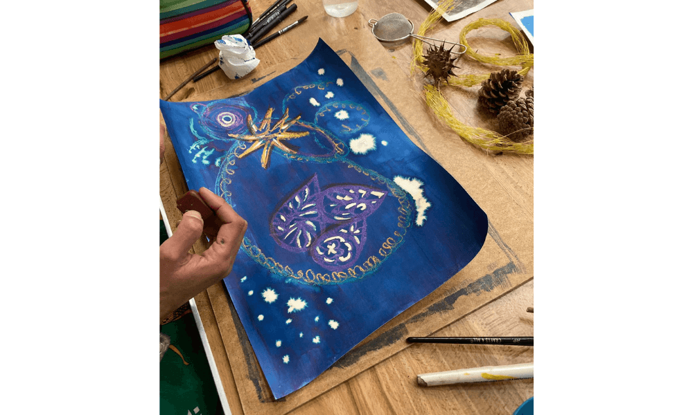 Person drawing shells