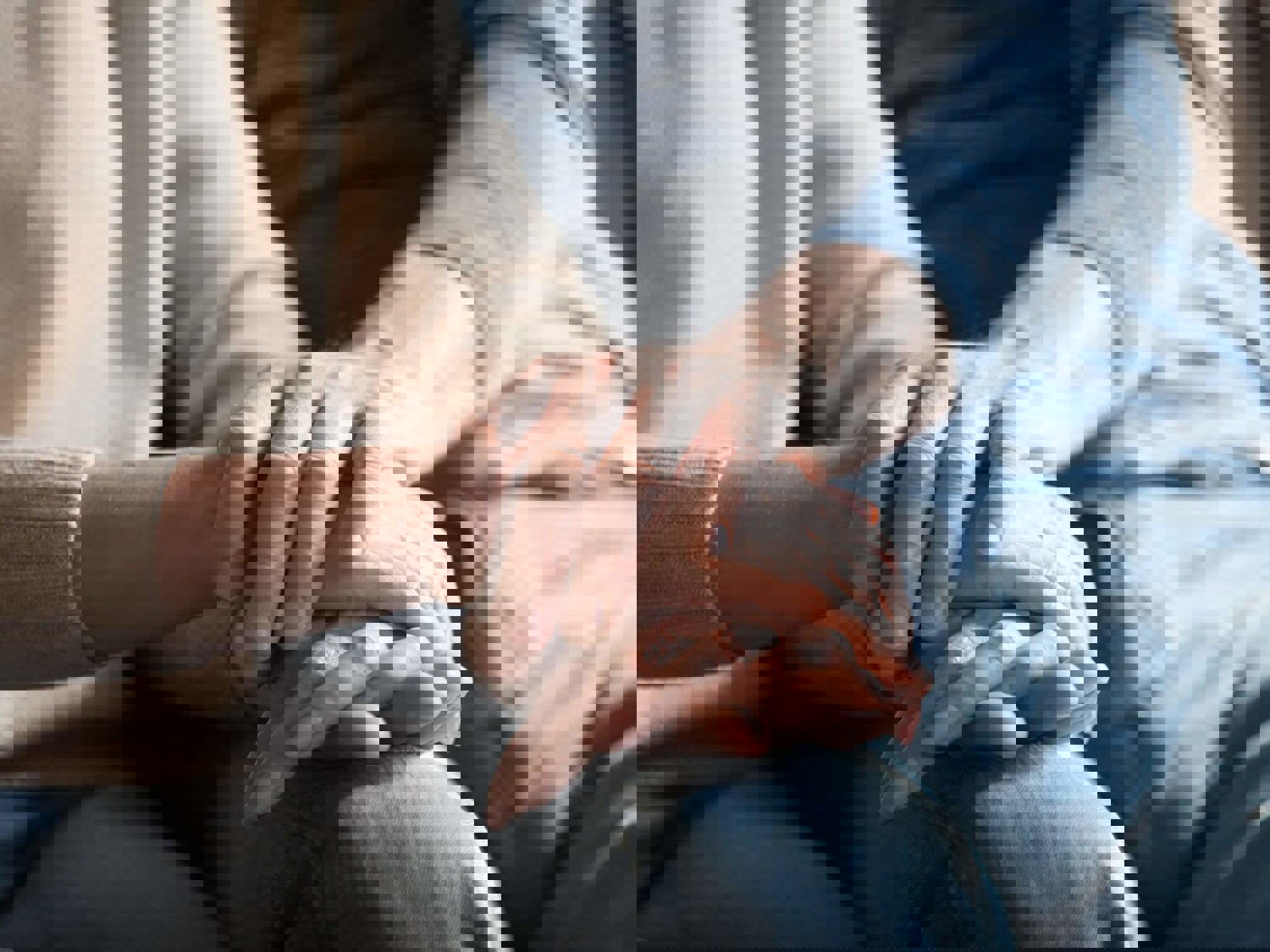 man and woman holding hands