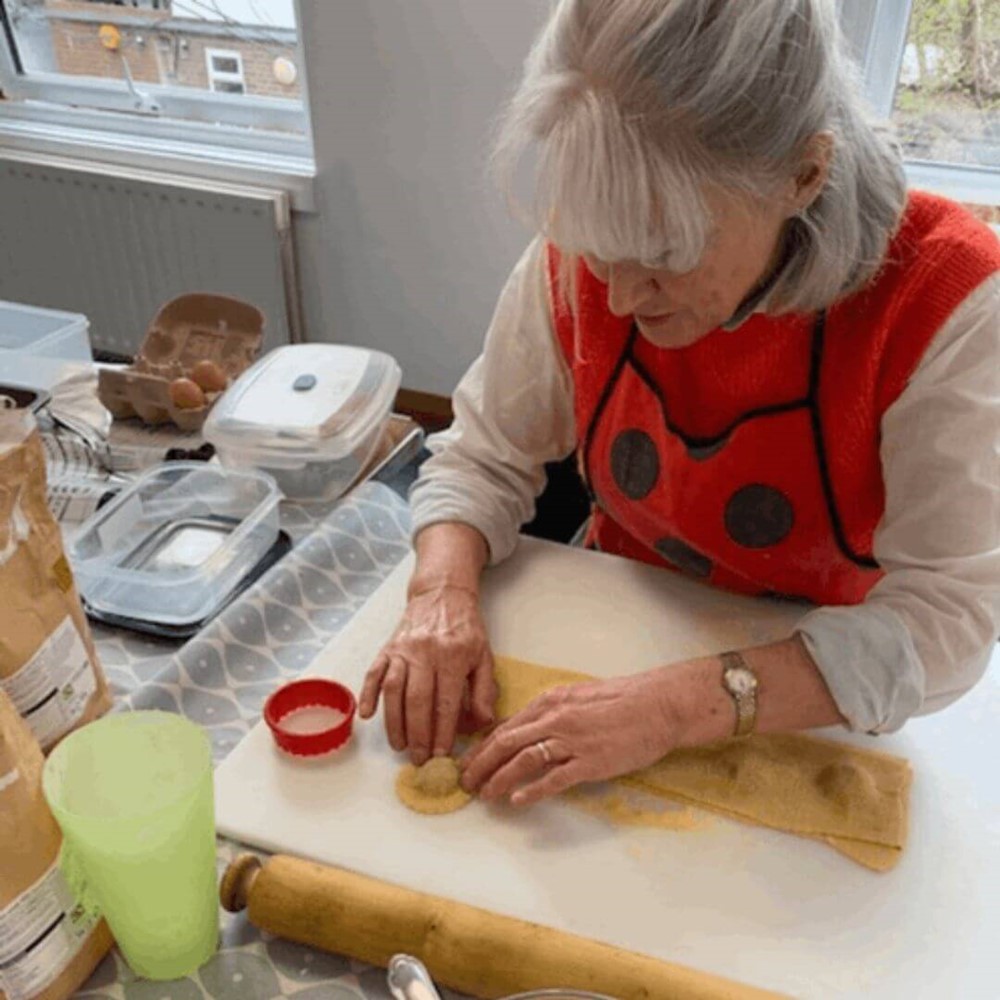 Lady making pasta shapes