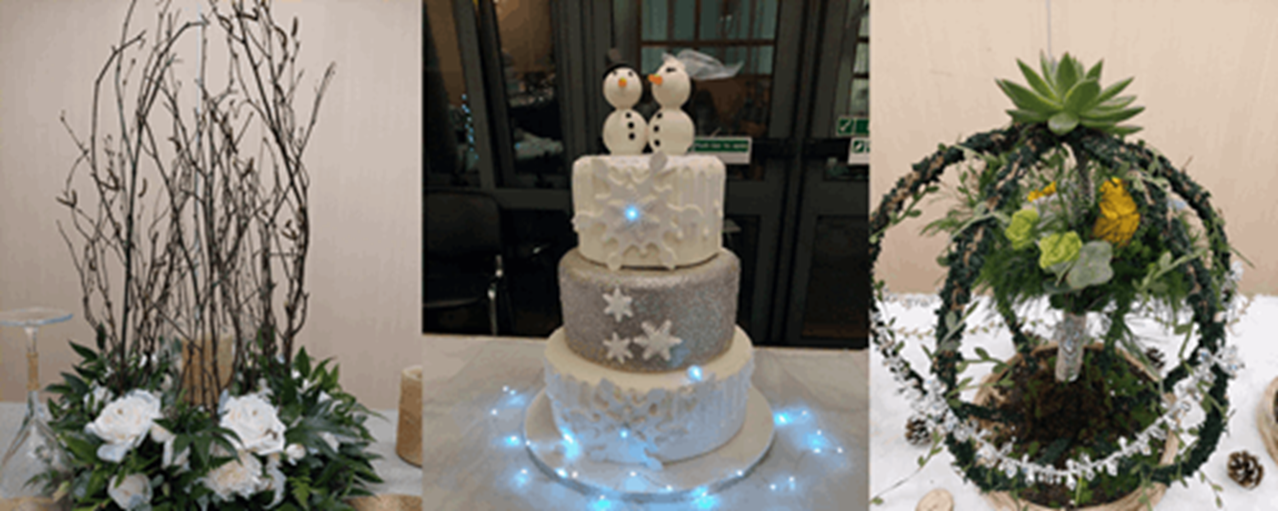 Flowers around candles and a snowman 3-tier cake