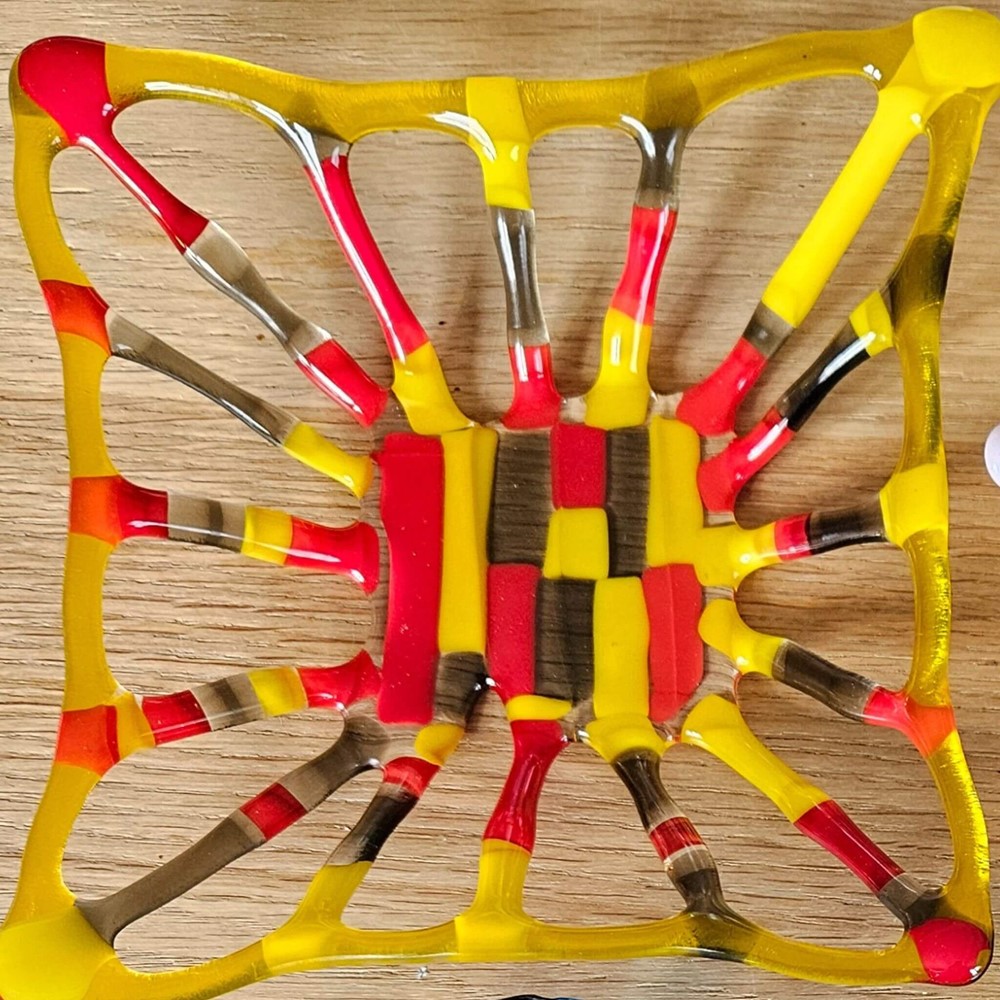 Yellow and red glass bowl