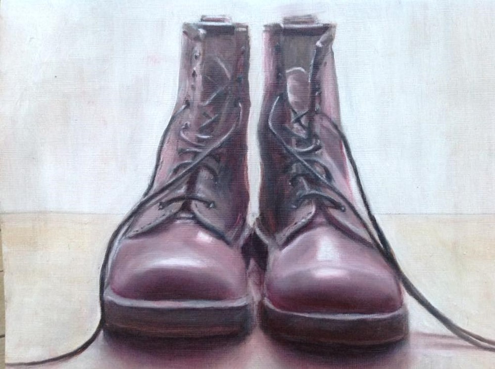 Painting depicting boots