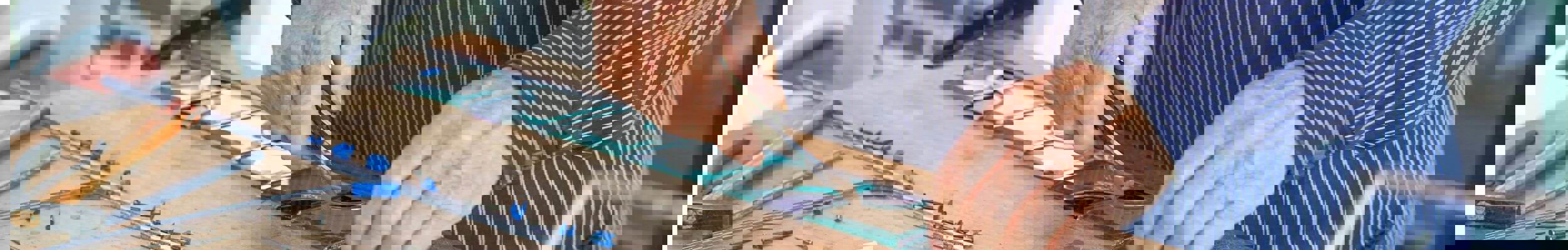 Man cutting glass
