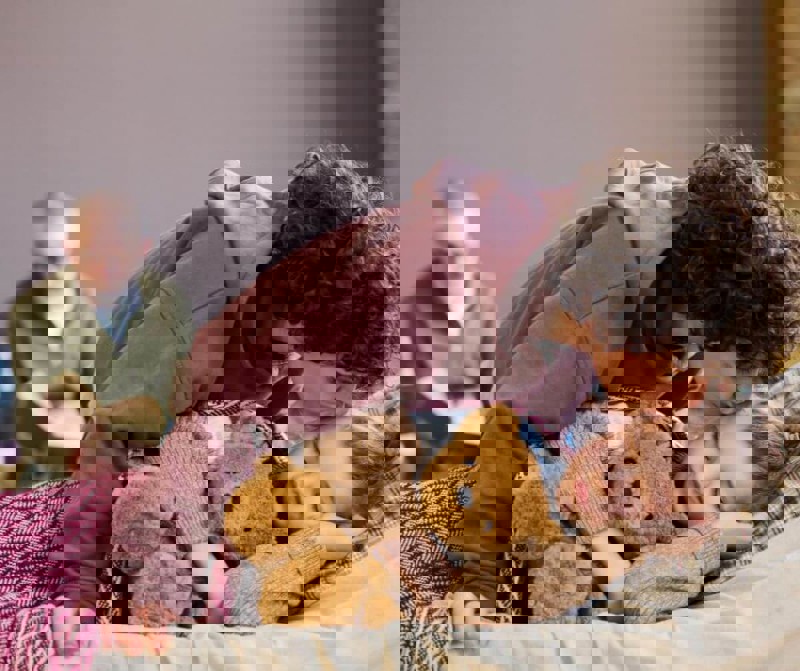 Parent settling child for sleep