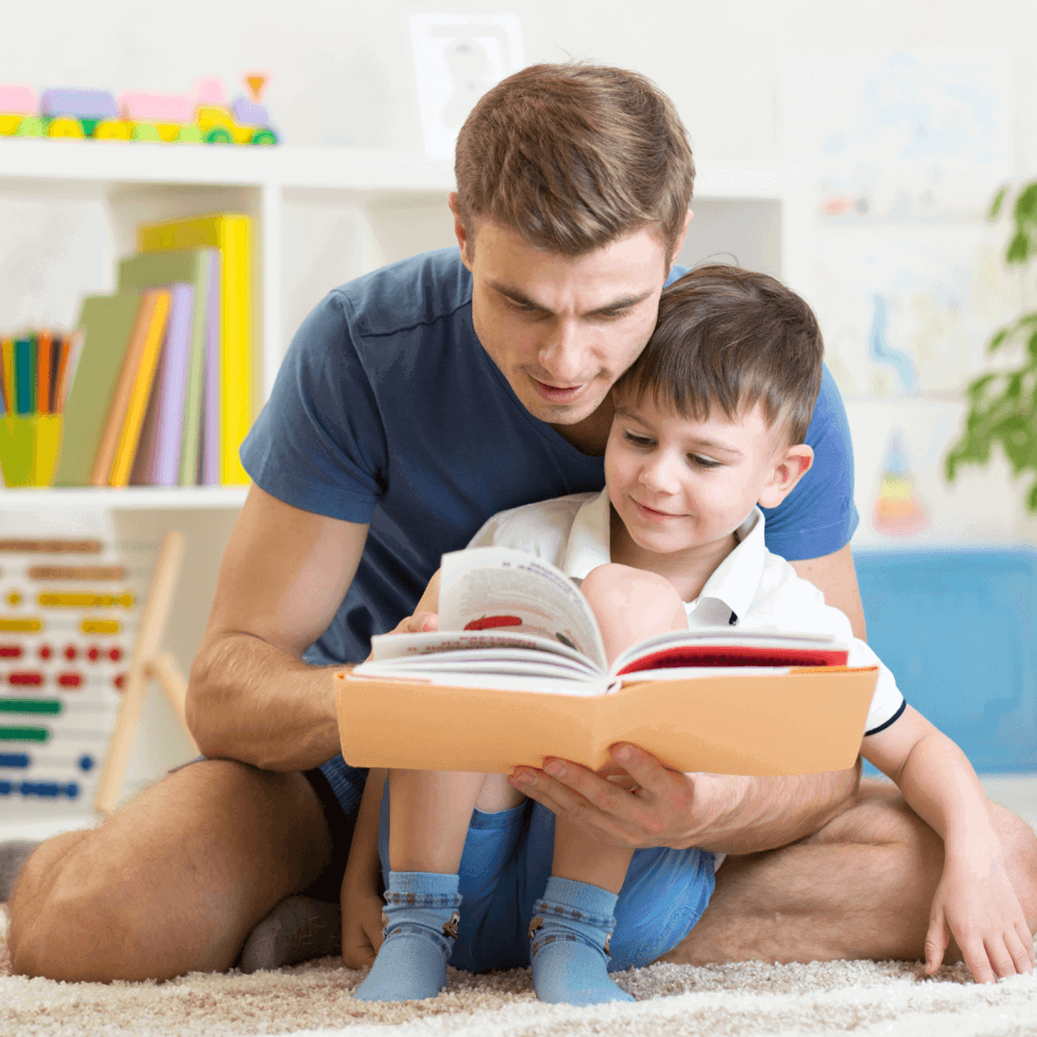 Man and boy reading