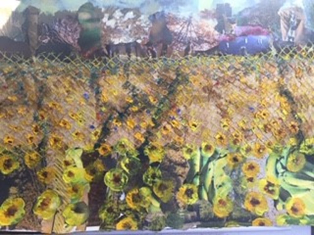 Learner painting of a field of sunflowers