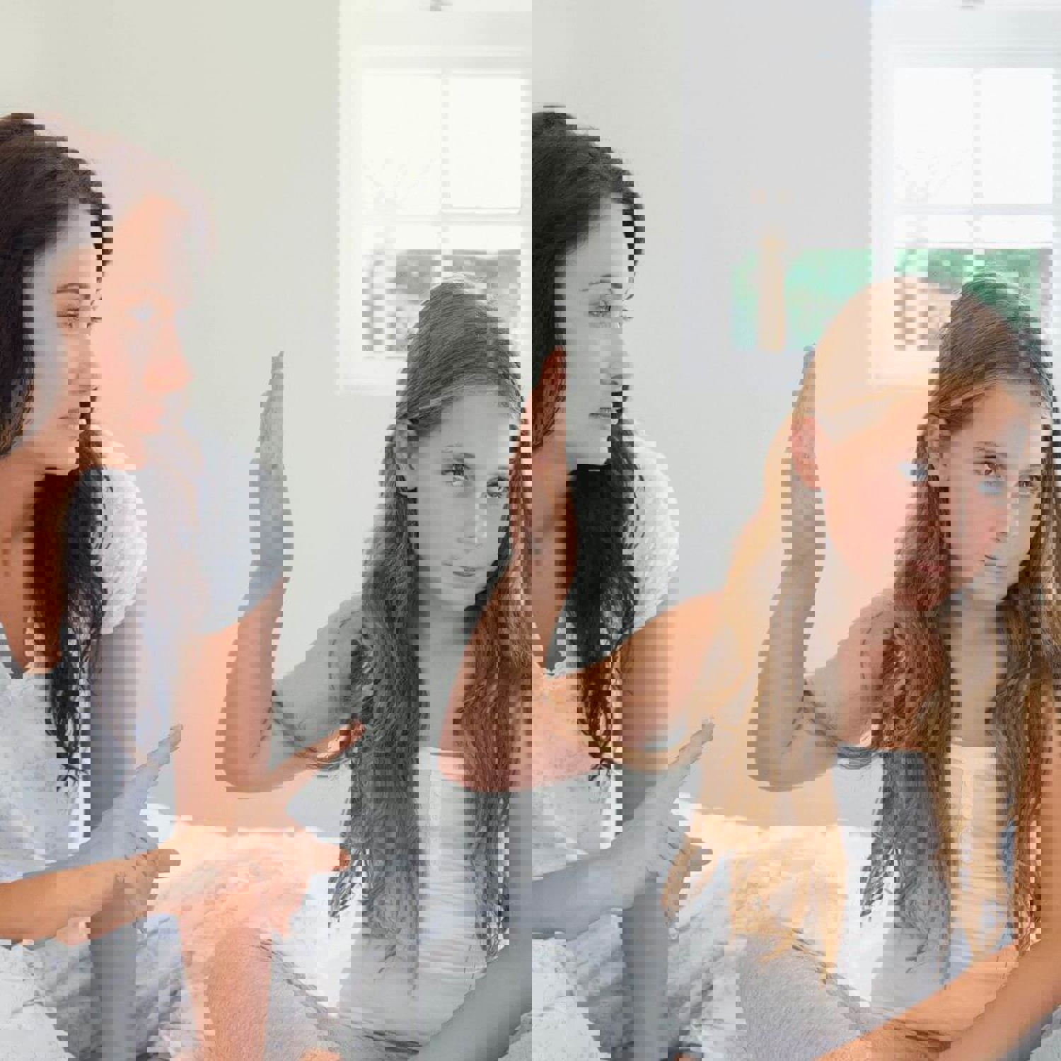 Girl putting hand up to women who is telling her off