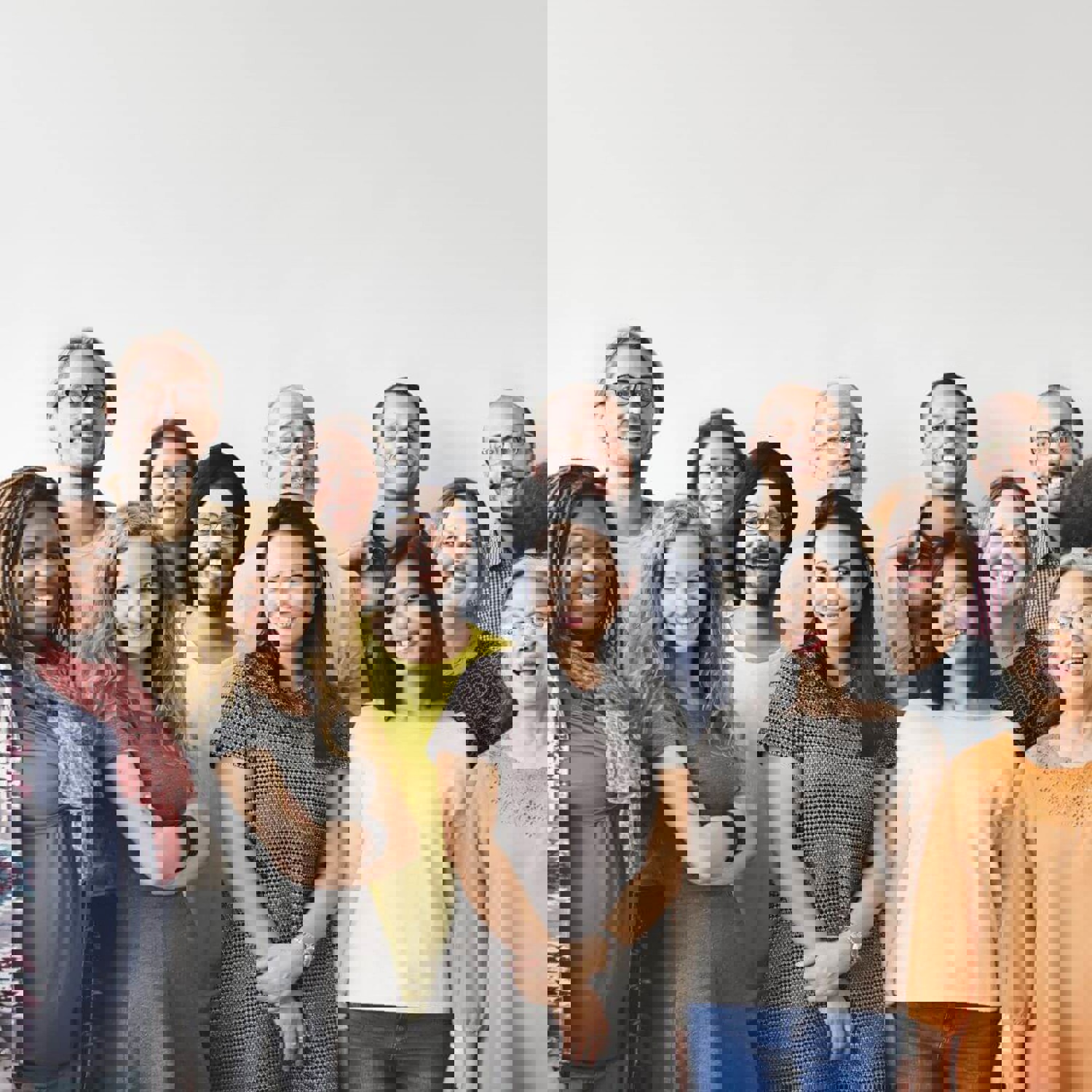 Group of people standing together smiling