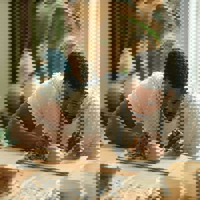 Man carving clay