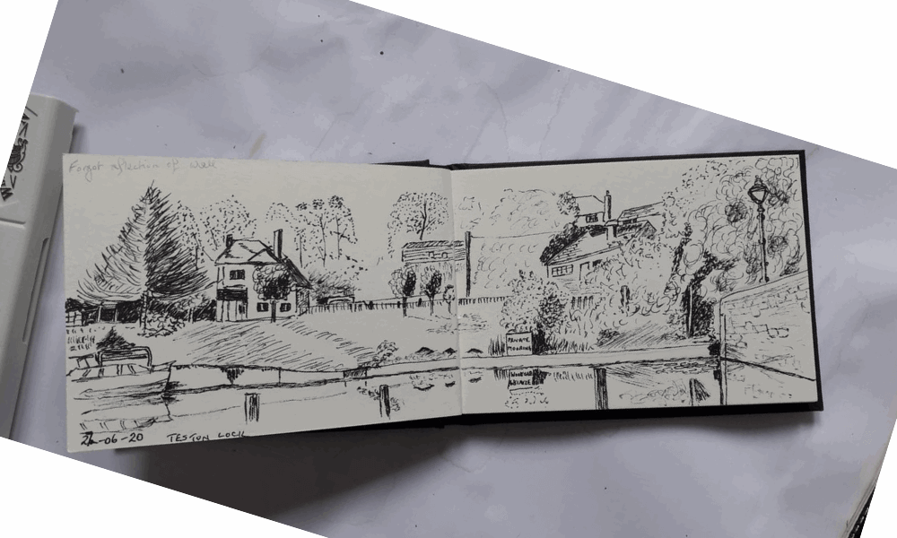 Photo of drawing of houses in sketchbook