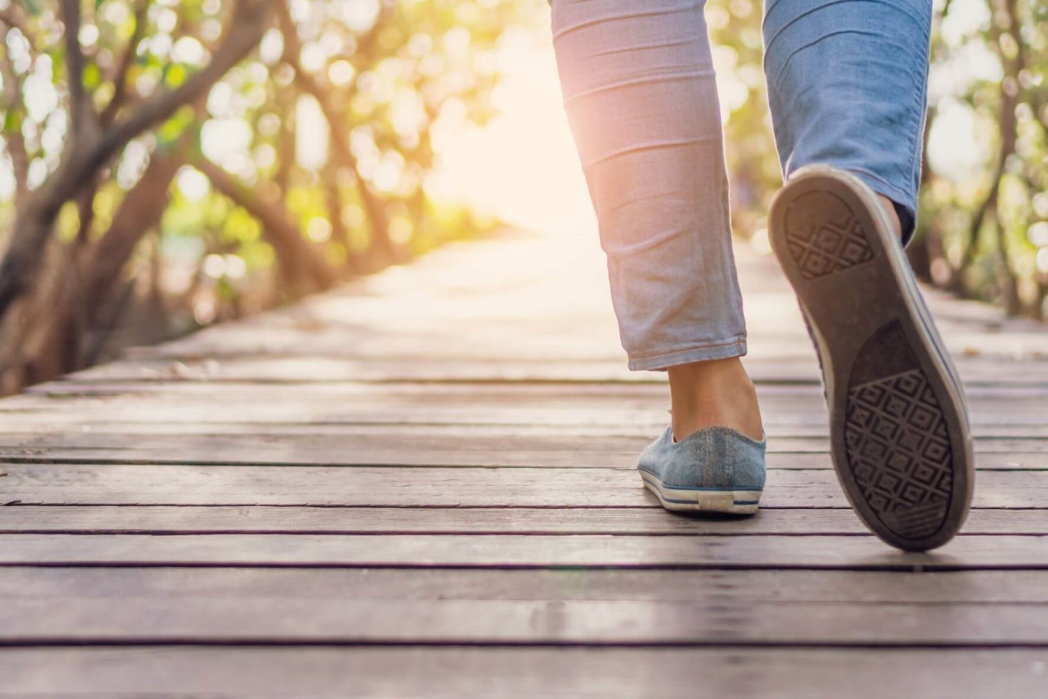 Person's feet walking outside