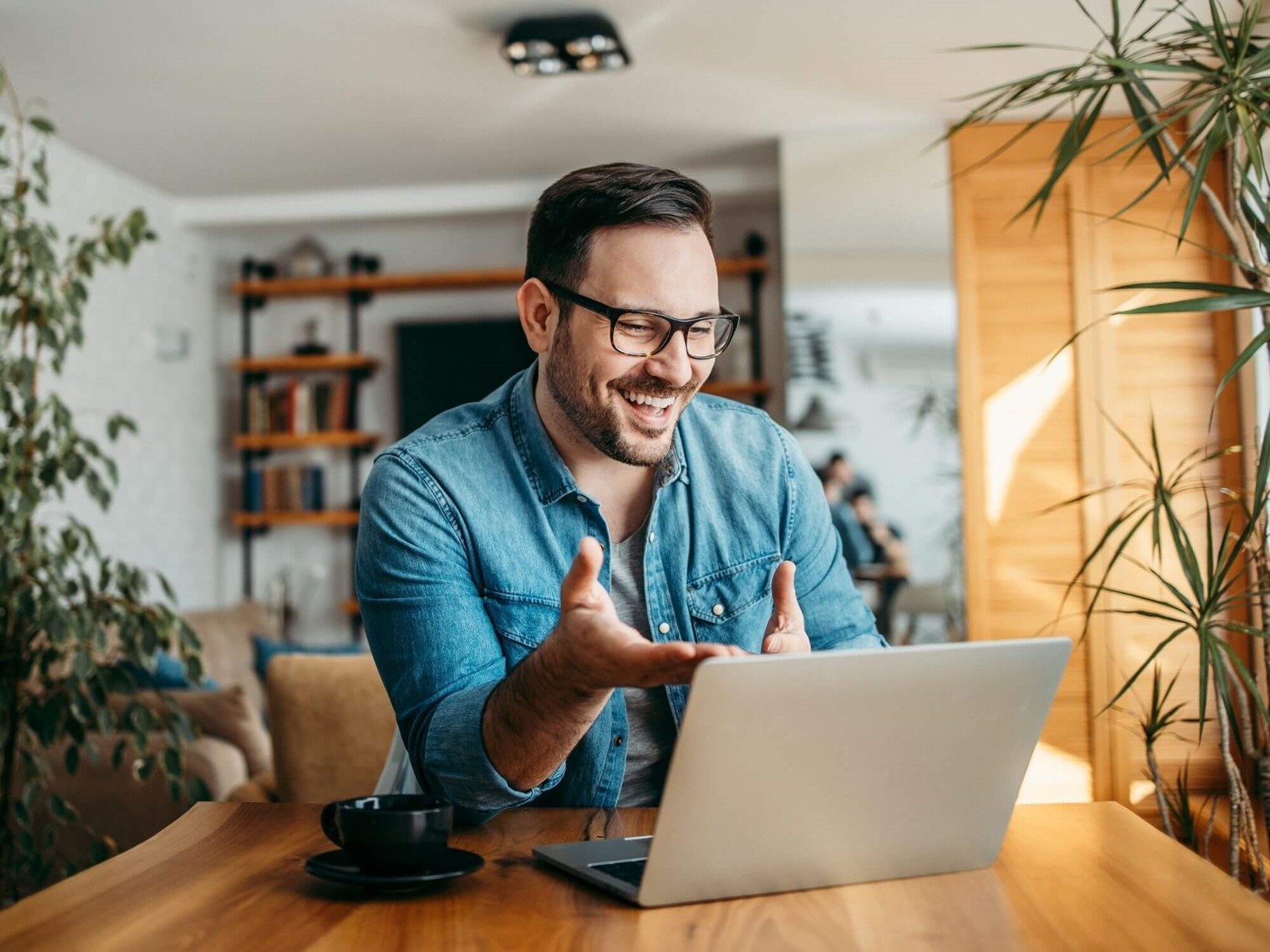 Man talking on laptop