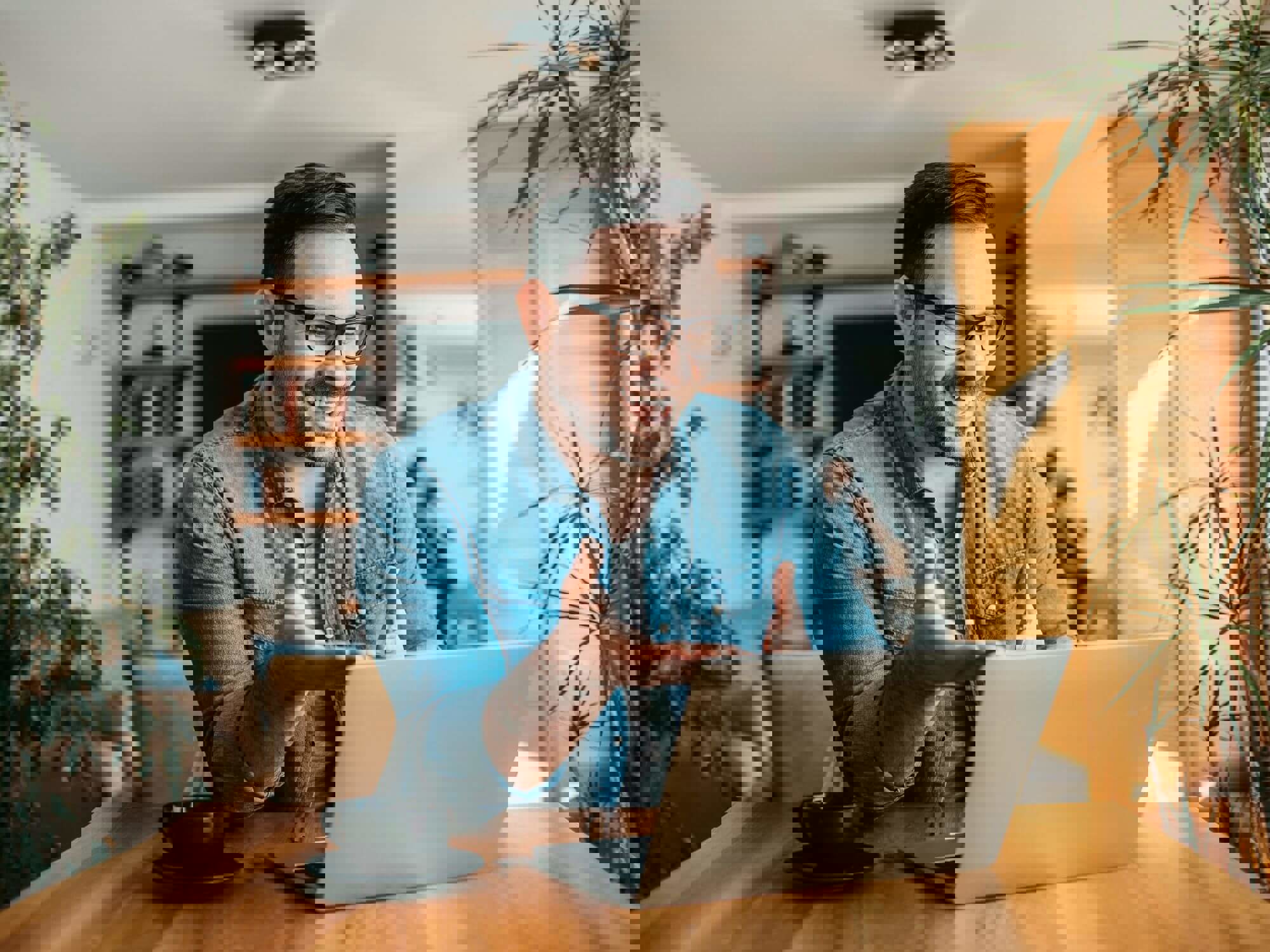 Man talking on laptop