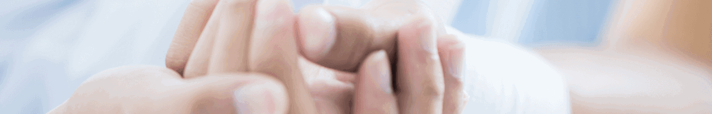 A hand being bandaged up