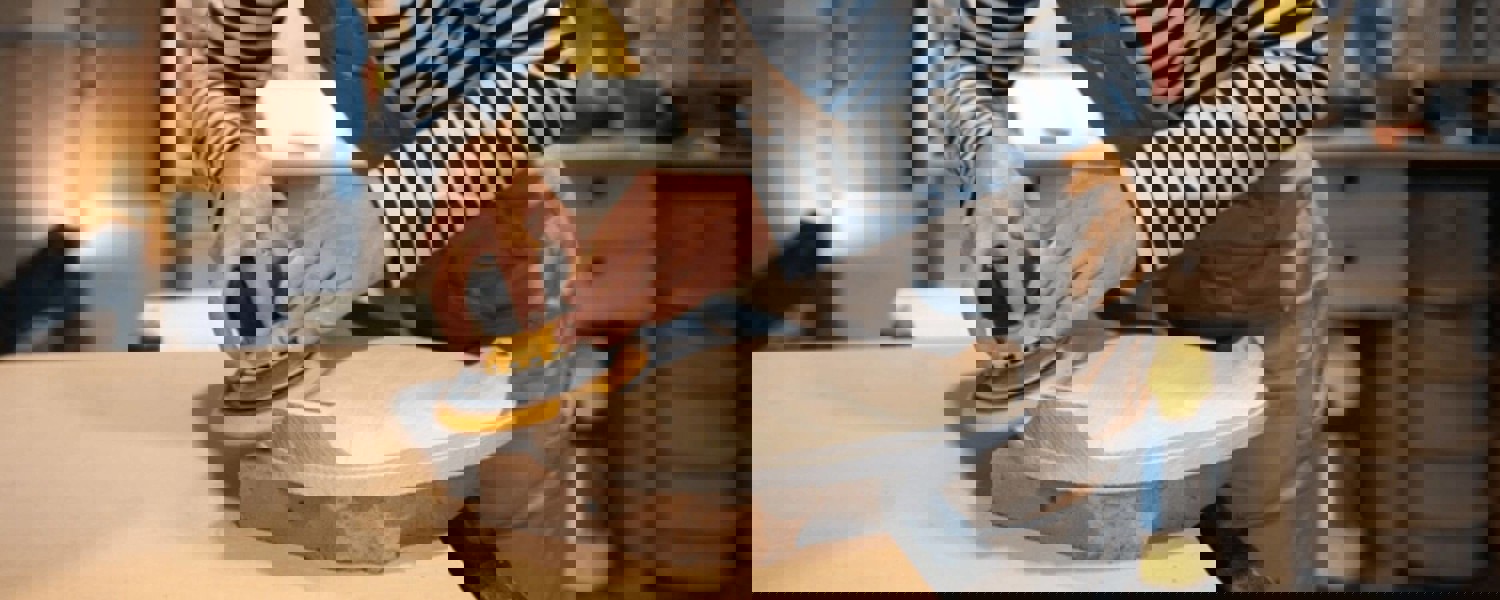 Man sanding wood