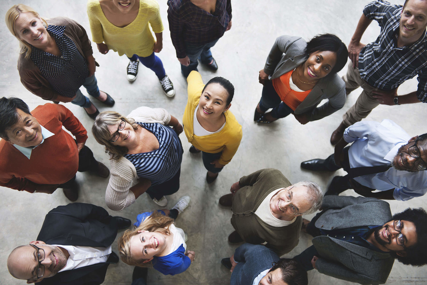 A group of diverse students looking at camera