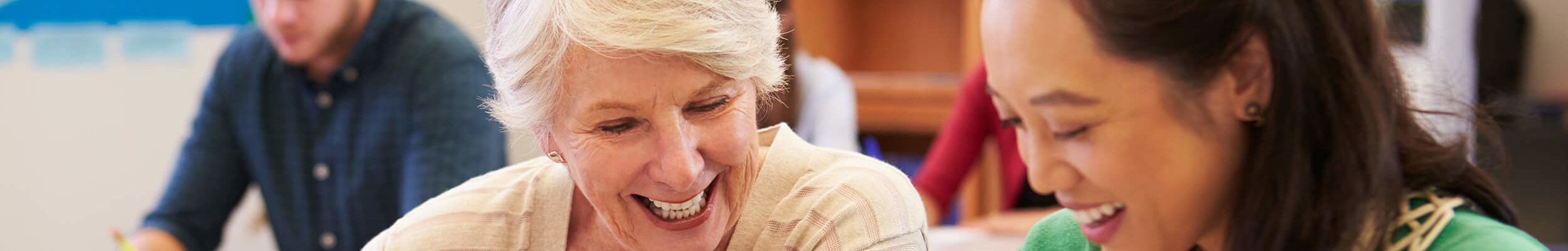 Two women in a creative writing course