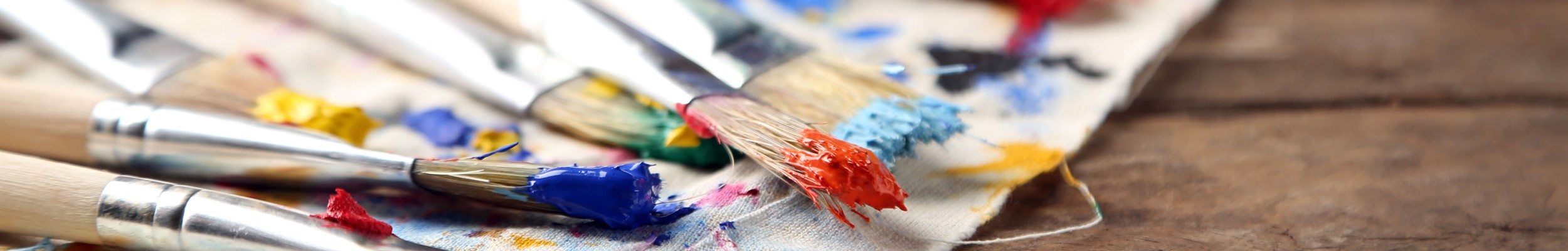 Brushes with paint on fabric