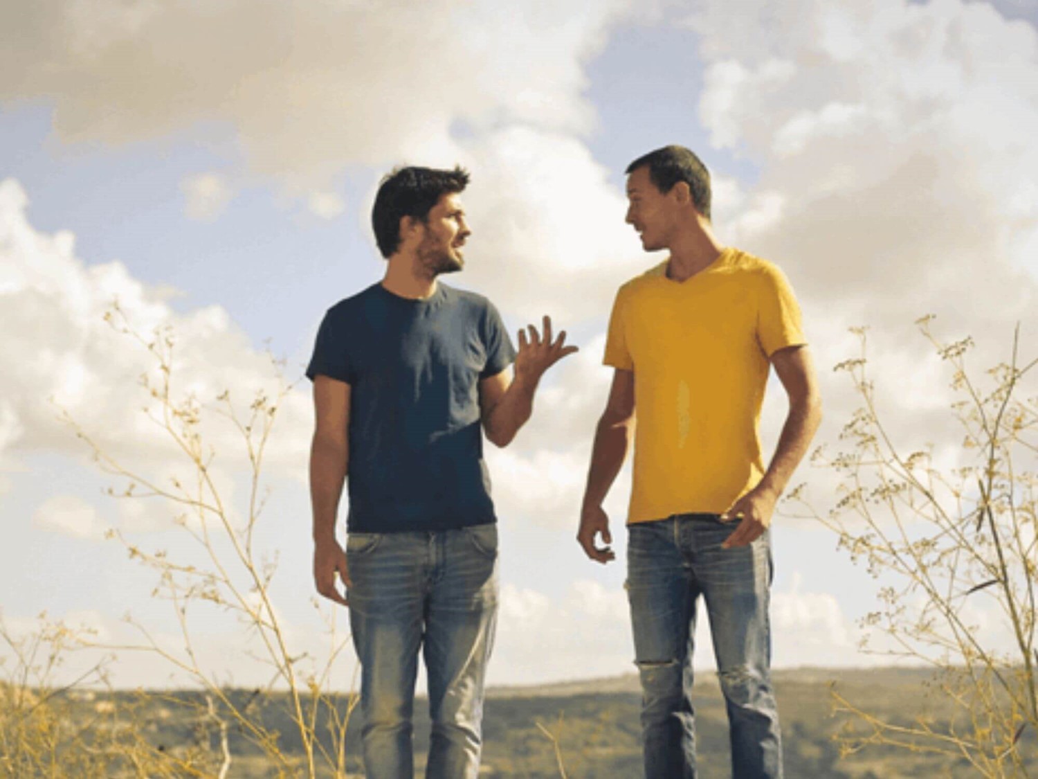 Men talking outside
