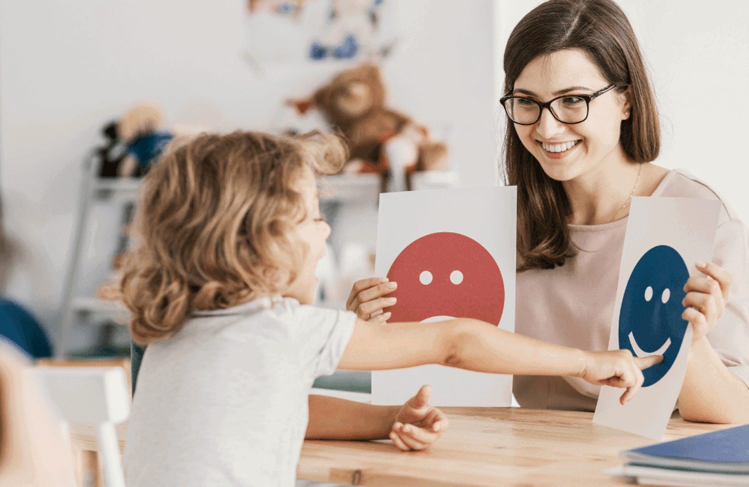Parent and child looking at flashcards