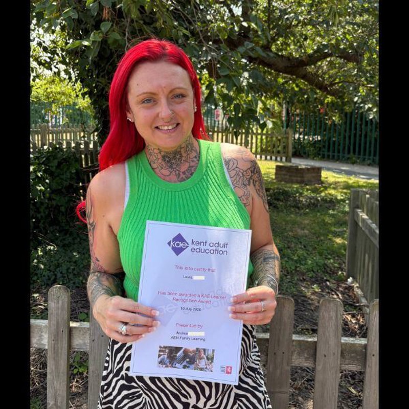 Laura, Family Learning learner holding Learner Award