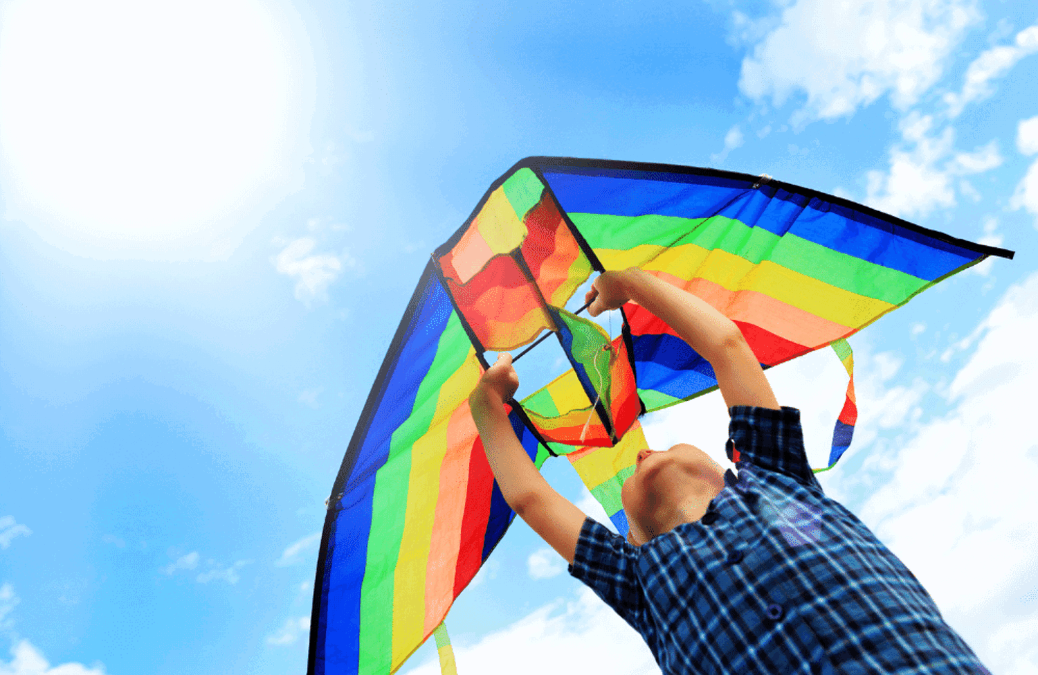 Child holding a kite