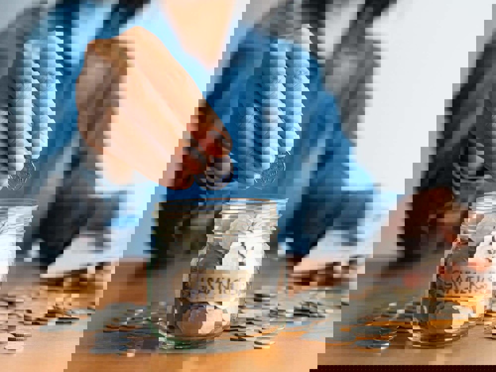 Counting coins in a savings jar