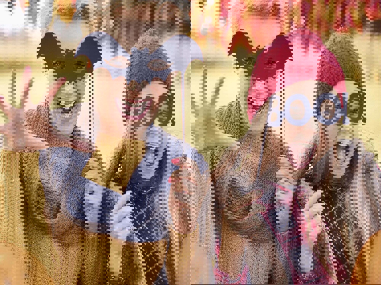 Two women in Halloween masks