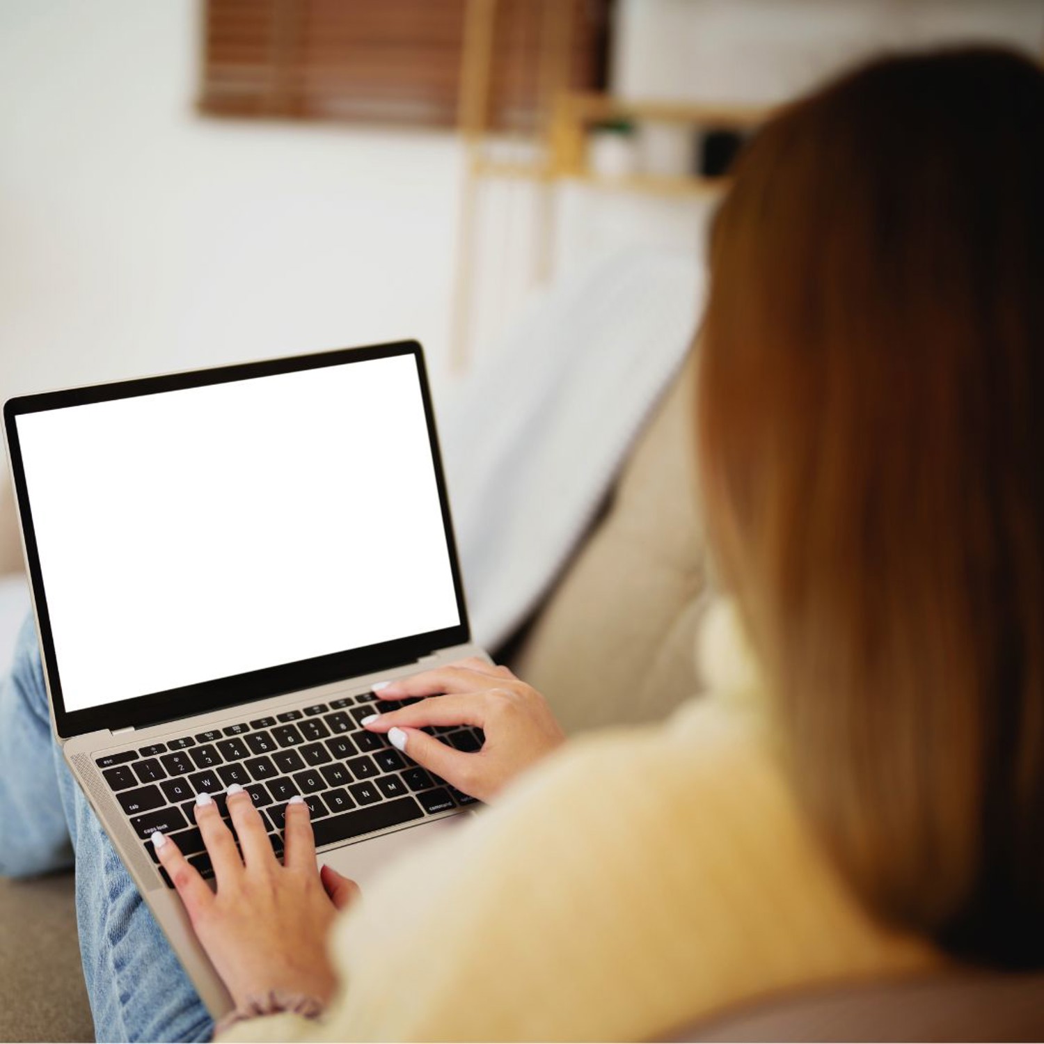 Person typing on a laptop