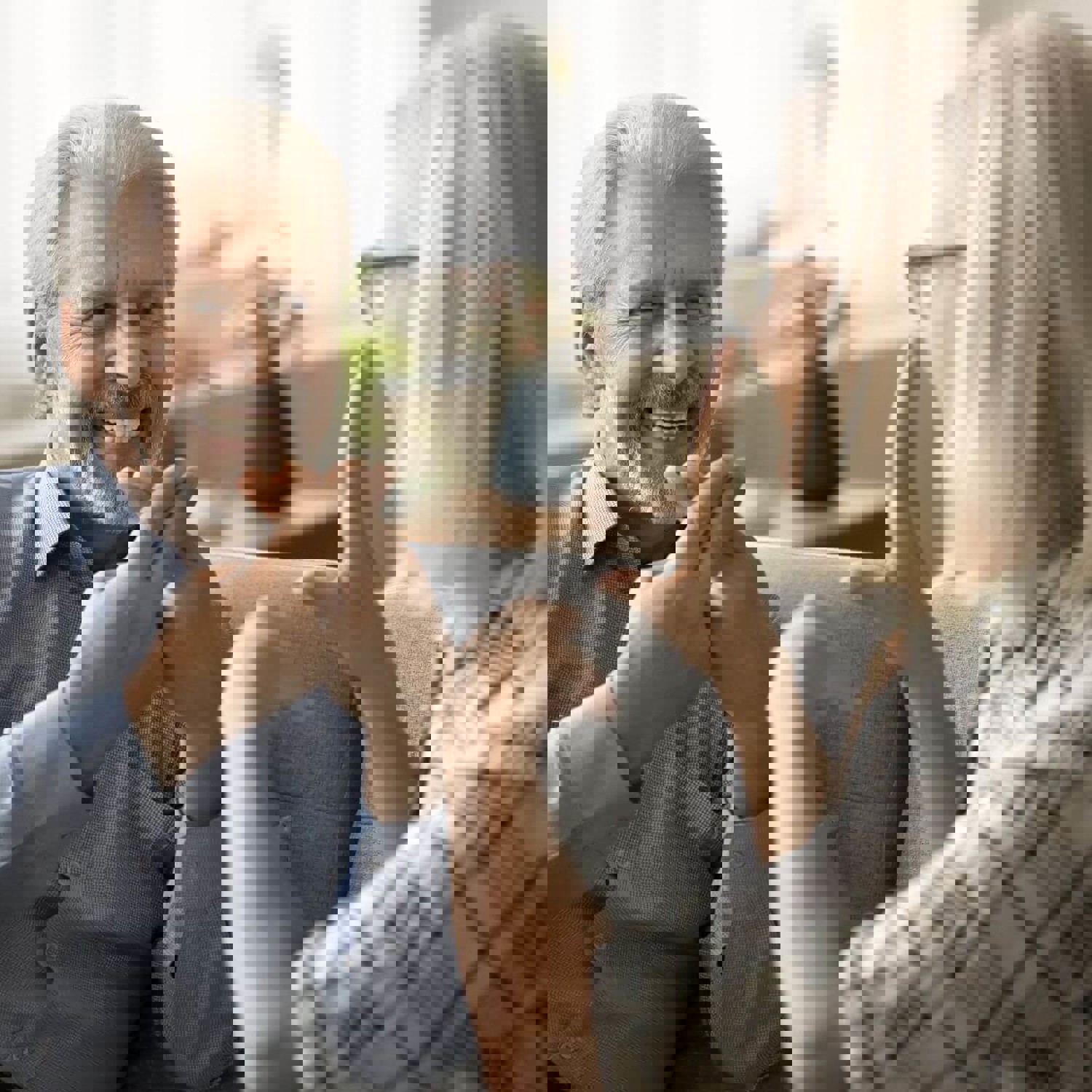 Two people communicating in sign language