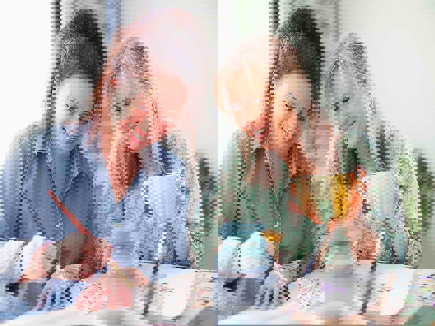 Two women painting 