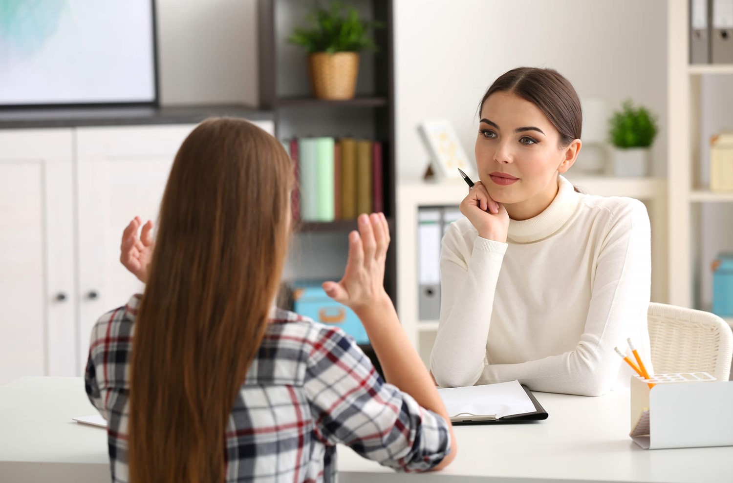 Two women in a counselling session
