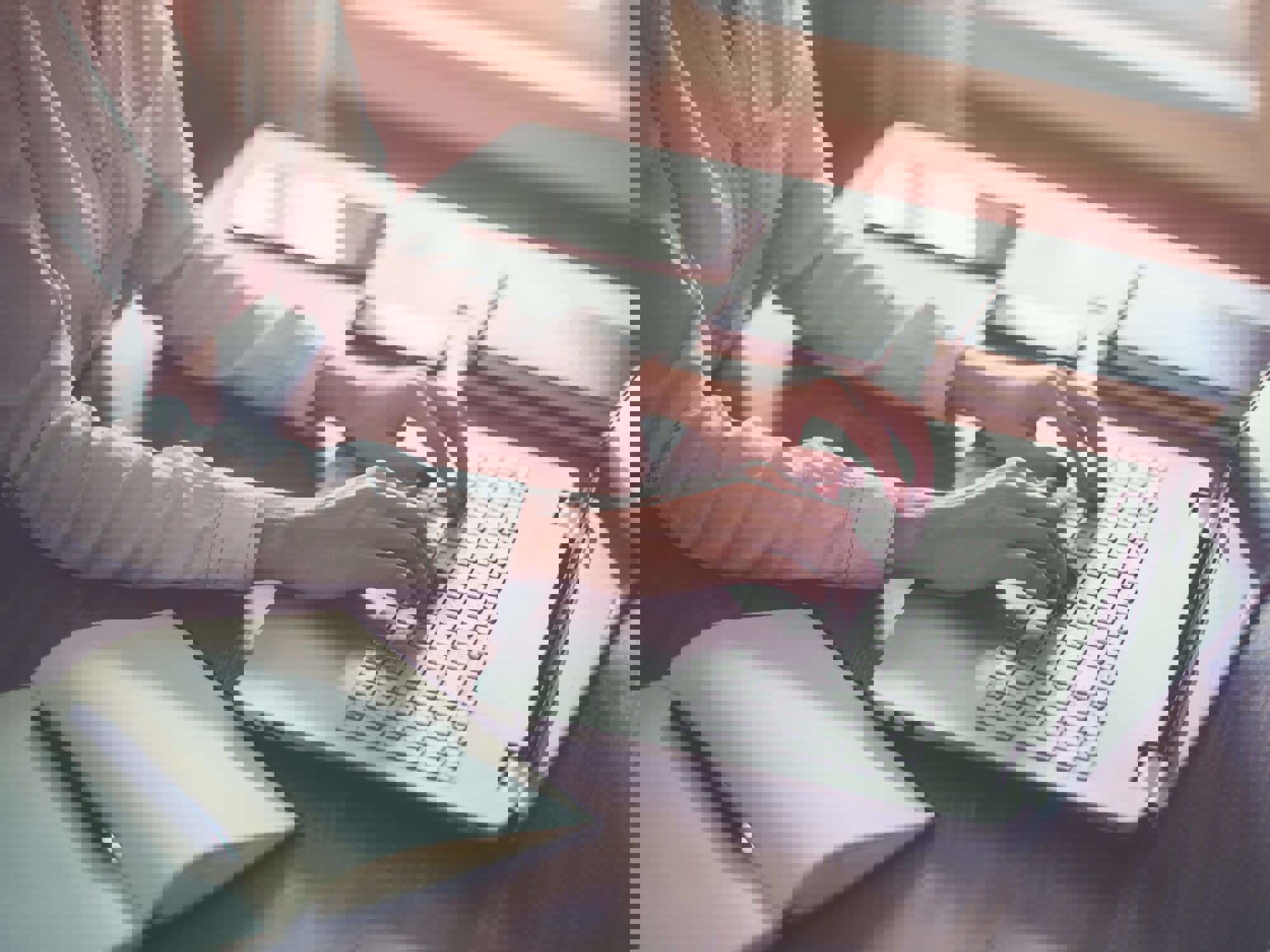 Woman typing on laptop