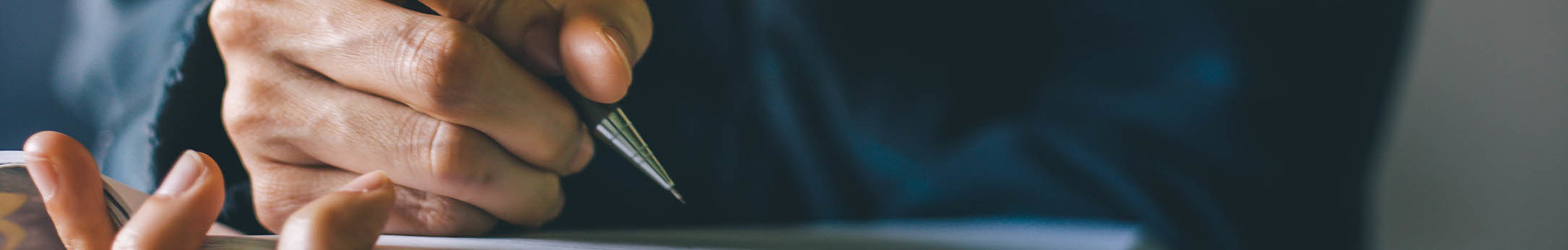 Writing notes on a pad