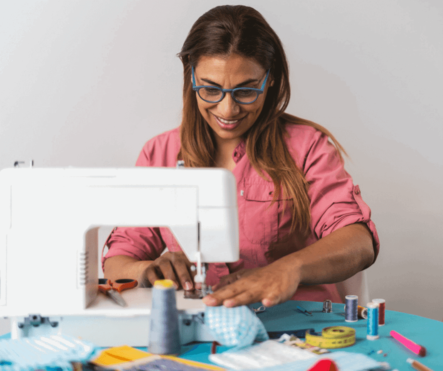 Woman at sewing machine