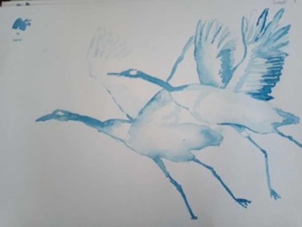 Watercolour painting of two storks
