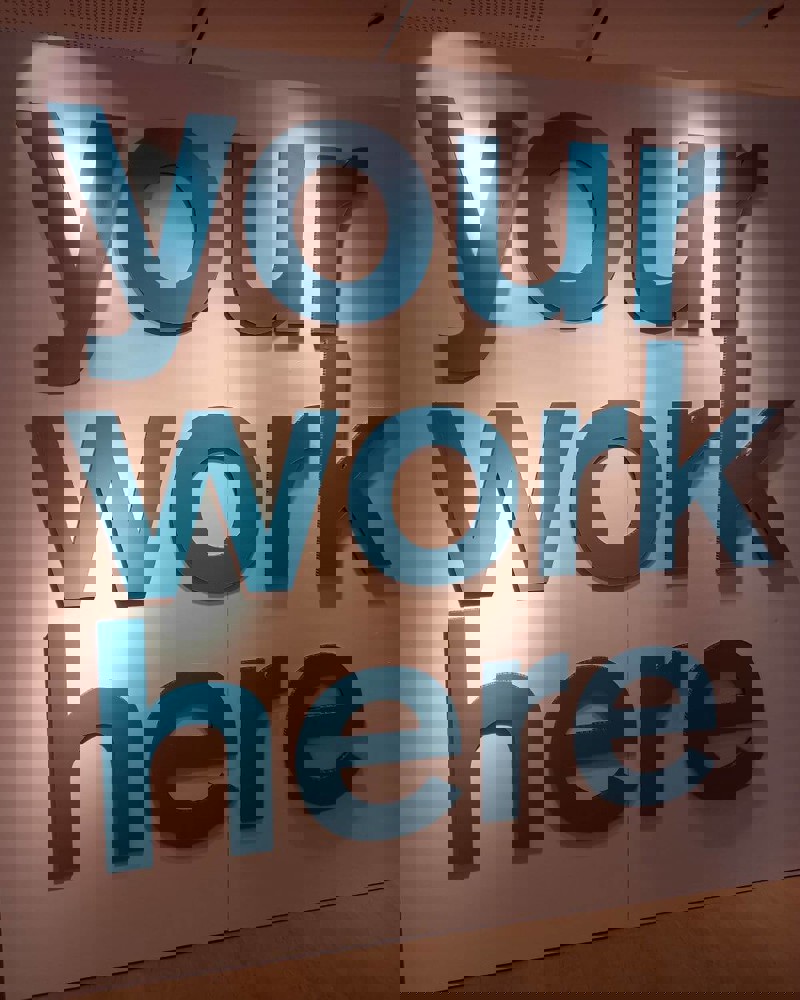 Image showing a sign saying Your Work Here