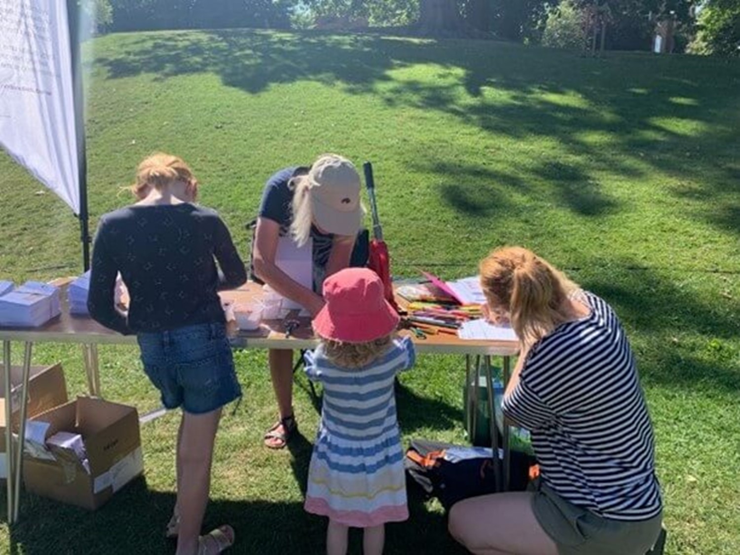 Children doing crafts outside