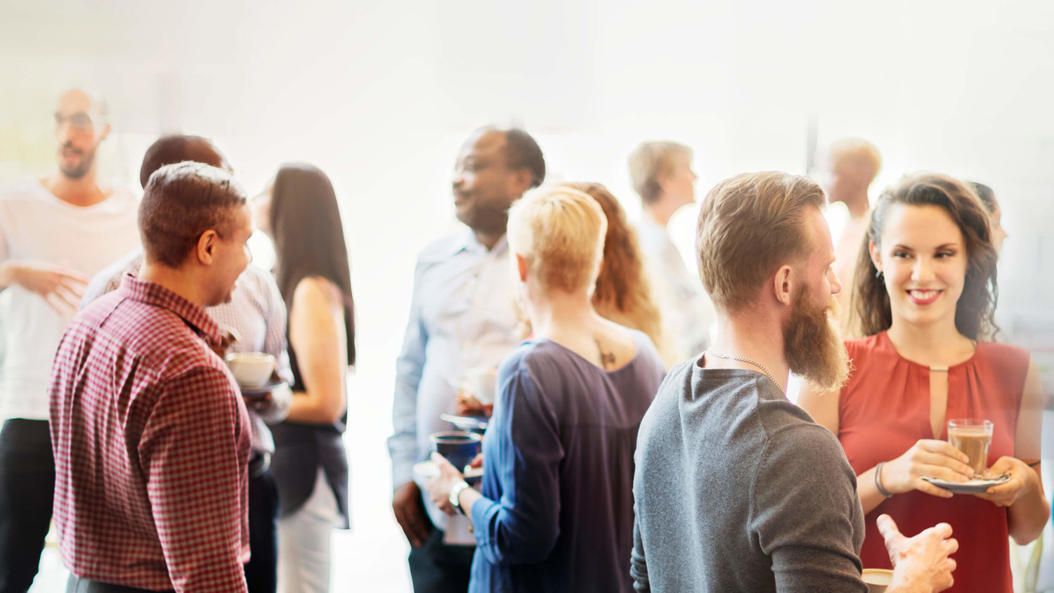 A group of adults gathered at an event