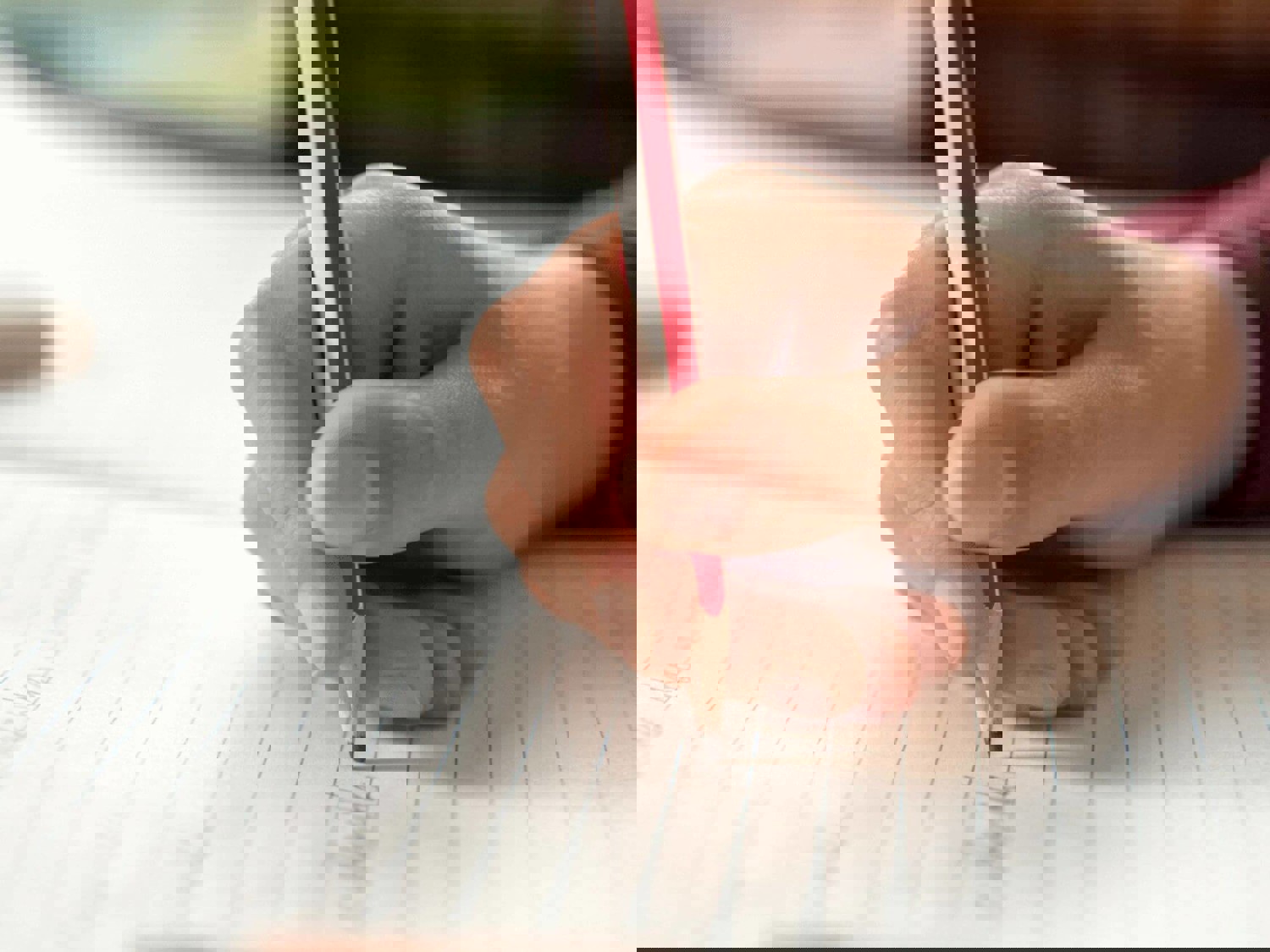 Close up of hand writing