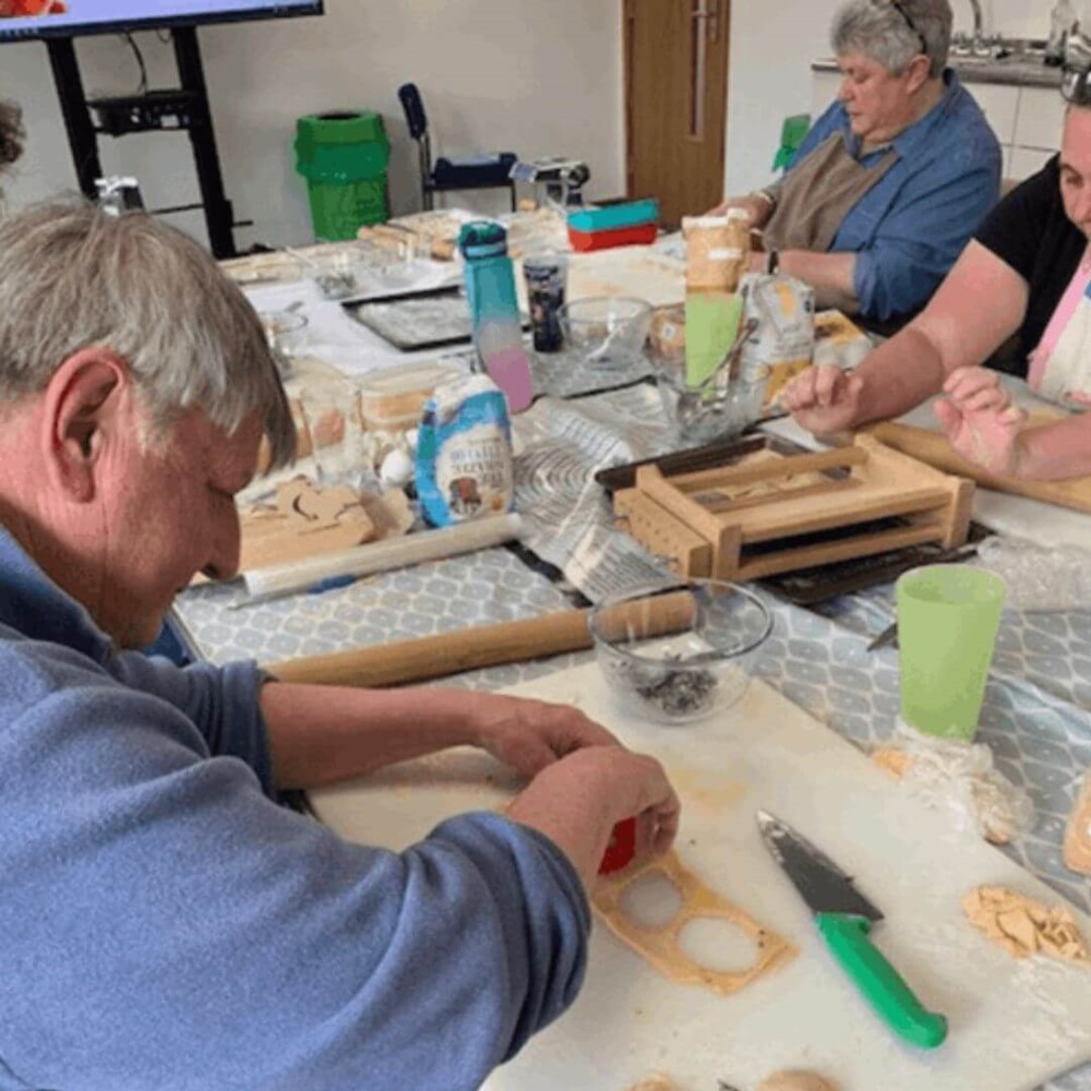 Learners cutting pasta