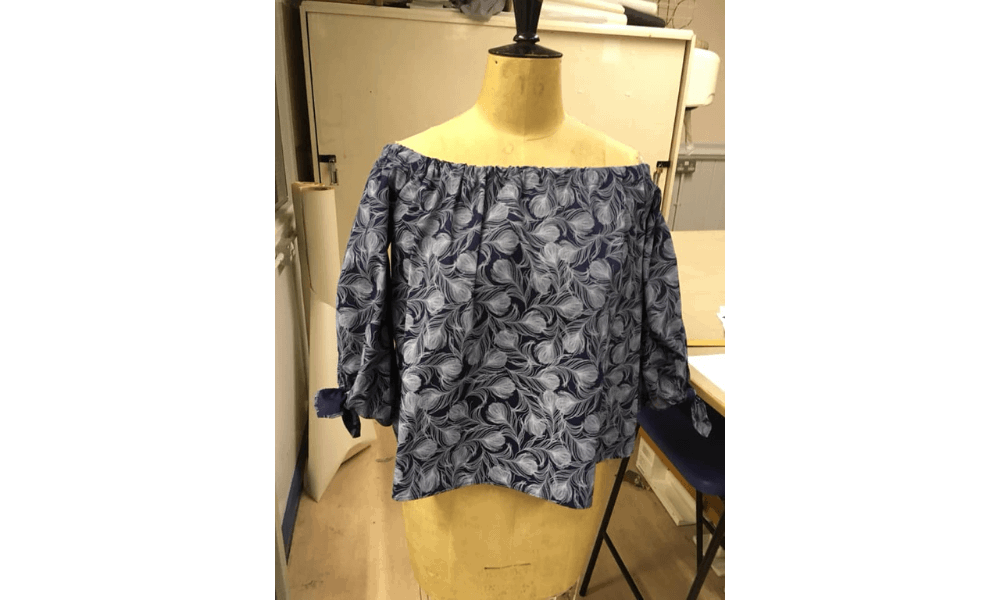 Feather pattern blue top
