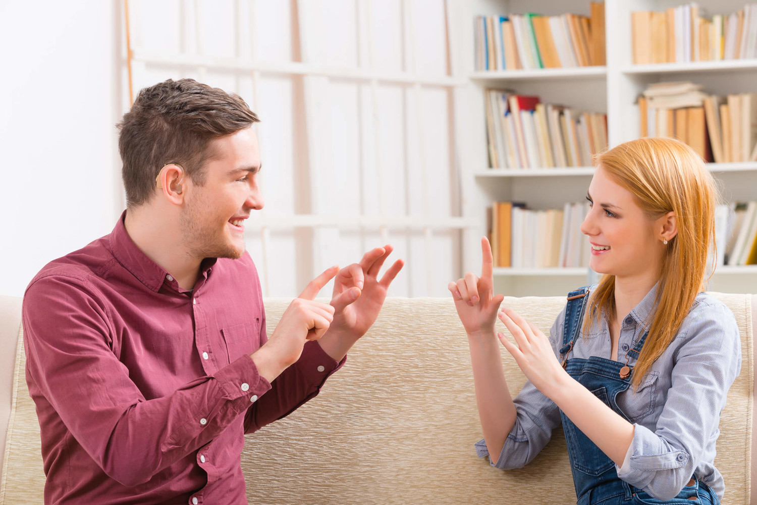 A man and woman smiling