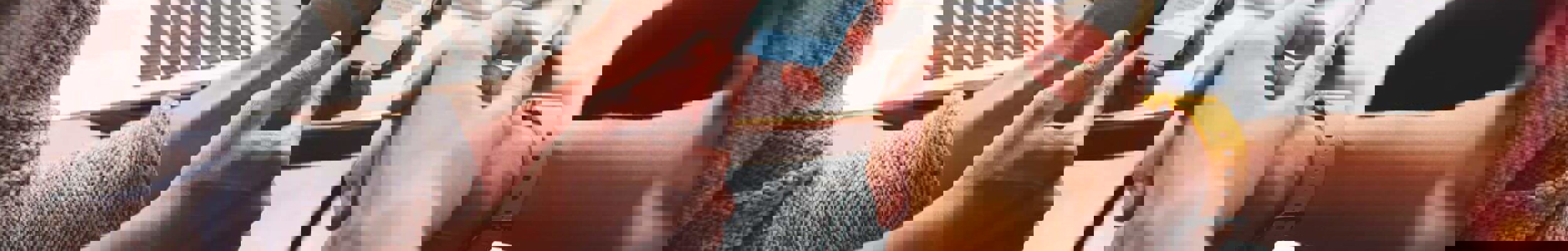 Two women looking at a mobile phone