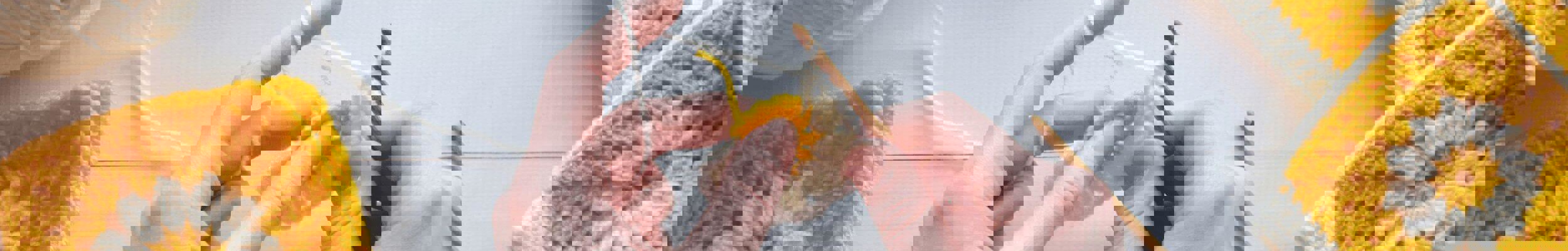 Hands crocheting granny squares